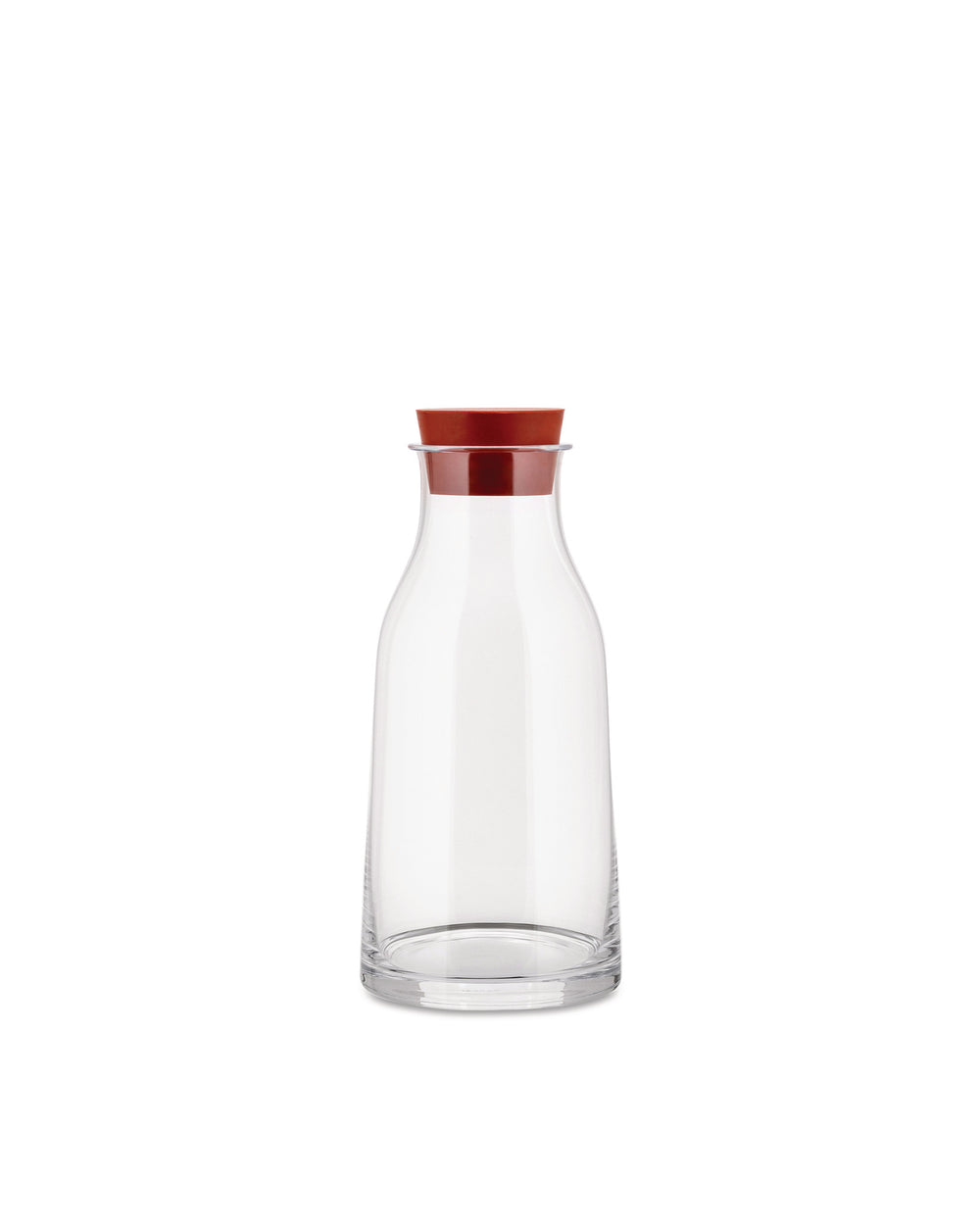 Clear glass pitcher with a reddish-brown stopper by Alessi, featuring a smooth, minimalist design.