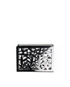 Silver metal napkin holder by Alessi with a modern abstract cutout design.