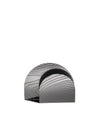 Metallic wavy-ribbed decorative holder by Alessi, with a semi-circular shape and reflective surface.
