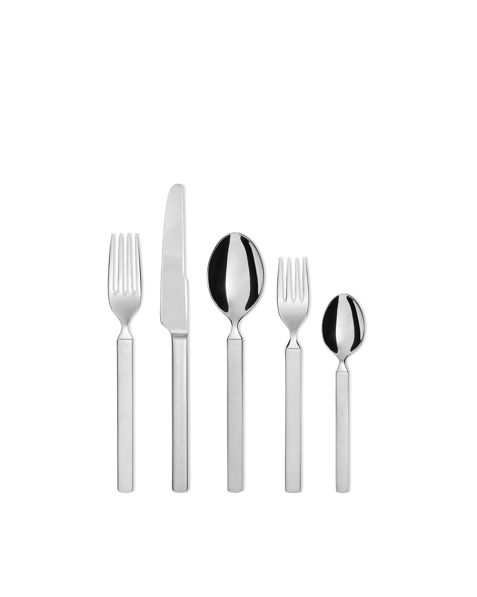 A five-piece stainless steel cutlery set by Alessi with matte handles and polished heads, arranged vertically on white.