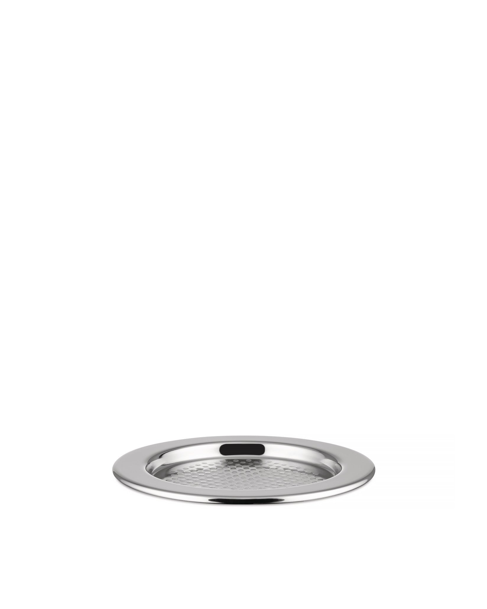 Round silver metal tray by Alessi with a textured honeycomb pattern and a black rectangular accent.