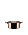 Shiny copper cooking pot by Alessi with a black interior and black side handles.