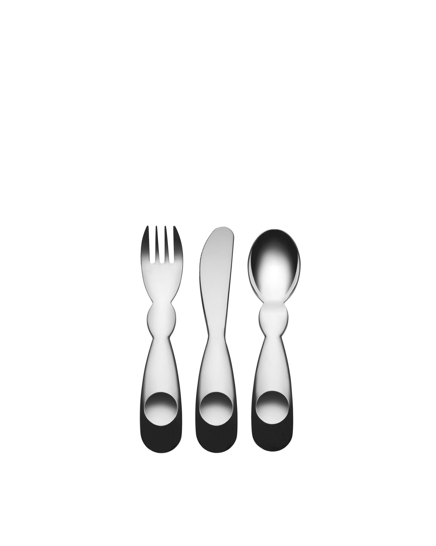 Silver-toned baby cutlery set by Alessi with distinct bulbous handles and dark bases.