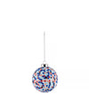 Spherical Christmas ornament by Alessi, covered in colorful polka dots, hanging by a silver chain.