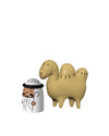Cartoonish Amir and Camelus figurines by Alessi, featuring a man in white with a staff and a smiling tan two-humped camel.