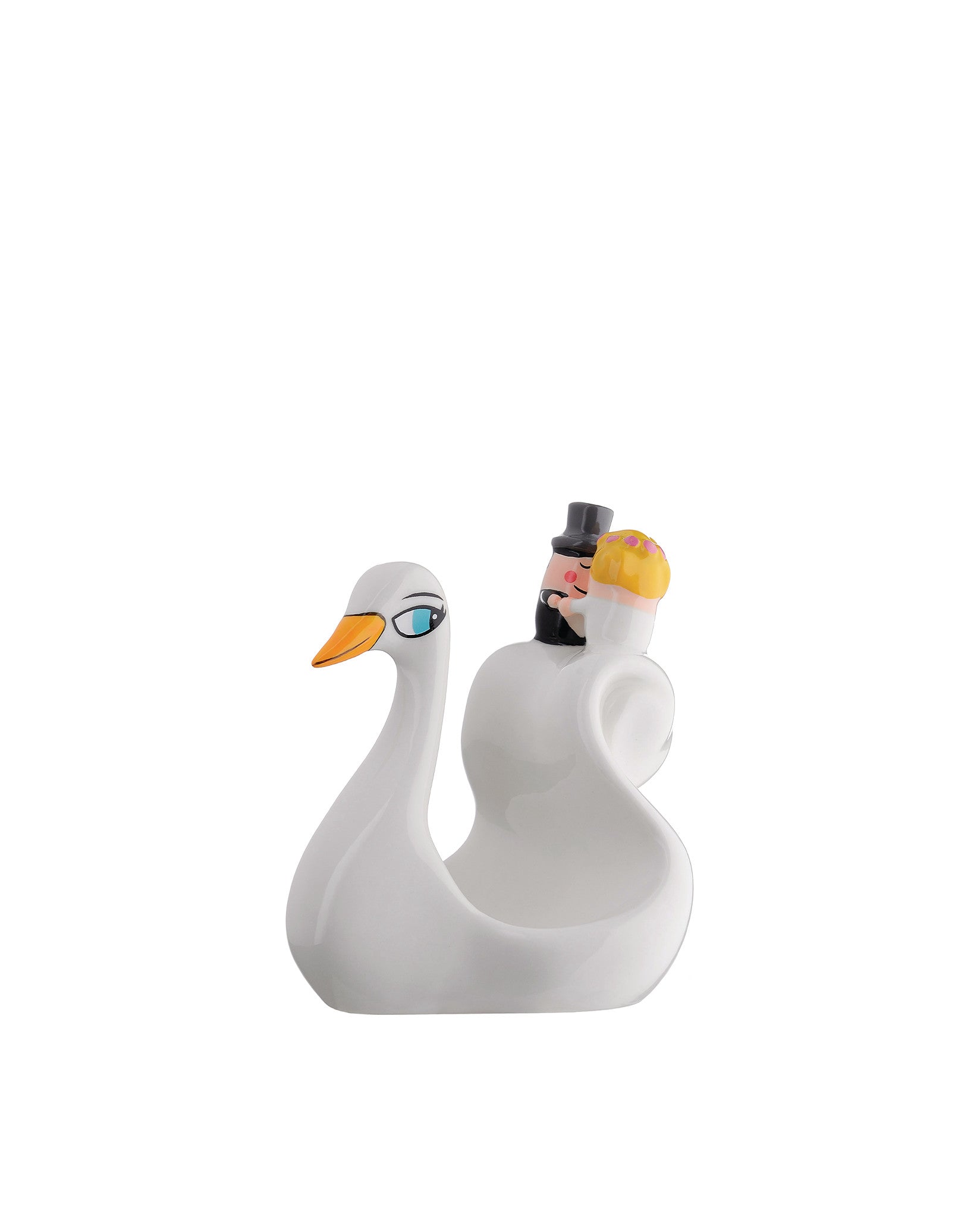 White ceramic decorative figurine by Alessi, a swan with blue eyes carrying two stylized human figures.