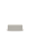 Light grey matte butter dish by Alessi, with a white base on a white background.