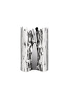 Silver polished metal cylindrical holder by Alessi with an organic, bark-like cut-out pattern.