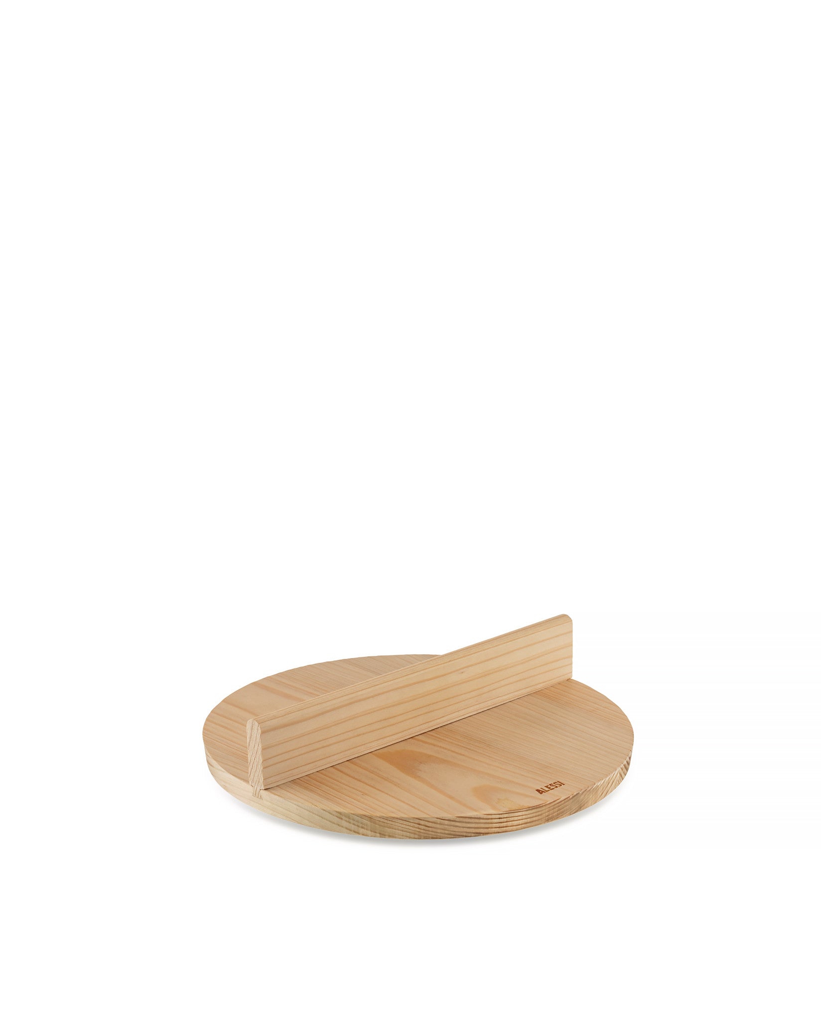 Round light wood pot accessory by Alessi with a raised rectangular handle and visible logo.