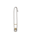 A black chain necklace by Alessi with a gold-toned bar and geometric black and gold pendant.