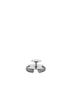 The silver metal tending box by Alessi, designed as a cocktail strainer with a central handle and coiled spring rim.