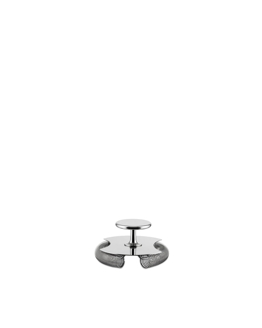 The silver metal tending box by Alessi, designed as a cocktail strainer with a central handle and coiled spring rim.