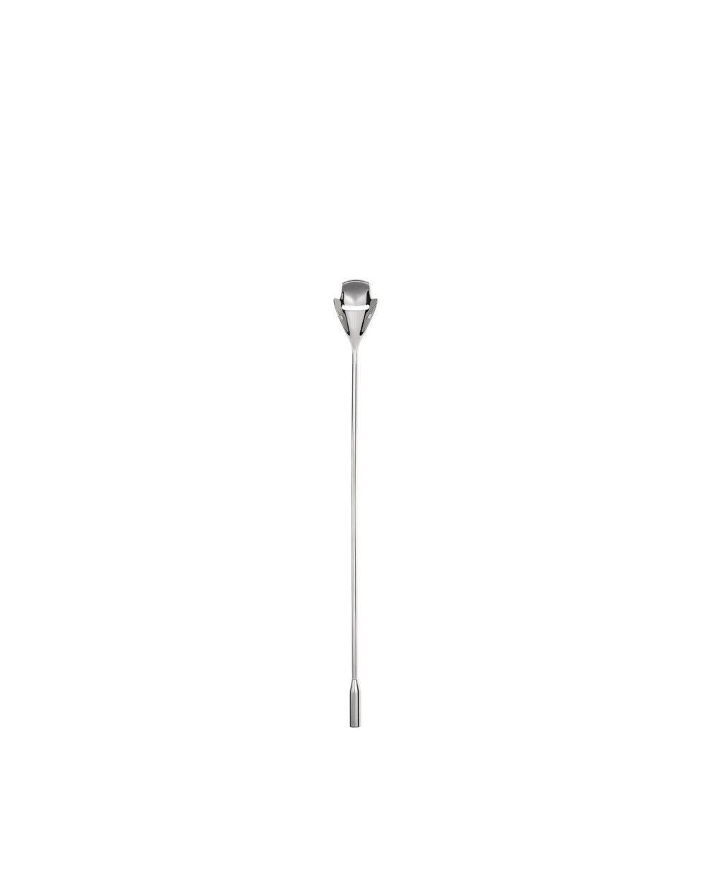 The tending box by Alessi, a polished silver metal honey dipper with a geometric cage head.