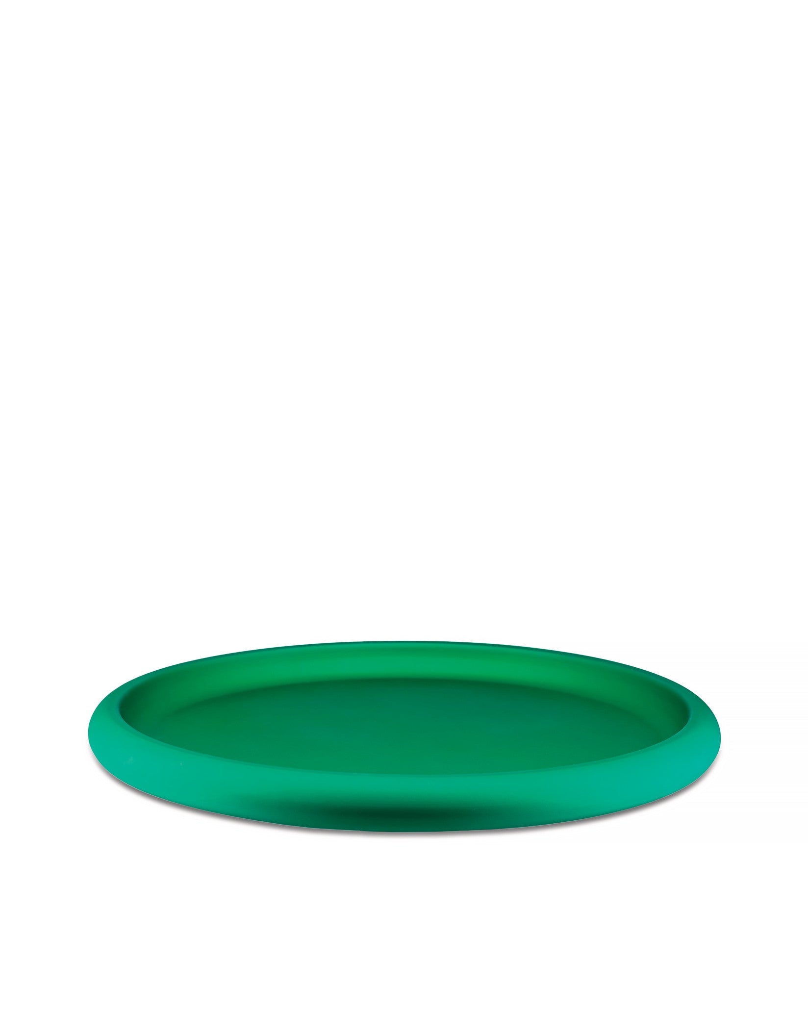 Matte green round Discolo tray by Alessi, with a shallow flat base and raised rim, on a white background.