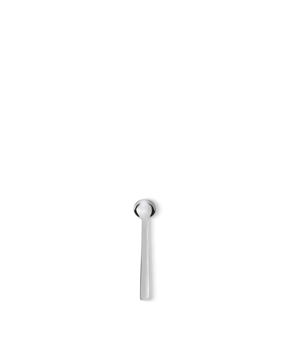 Silver metal spoon by Alessi with a round bowl and slender handle, shown top-down.