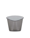 Smoky grey translucent container by Alessi with a subtle wavy rim and darker accent.