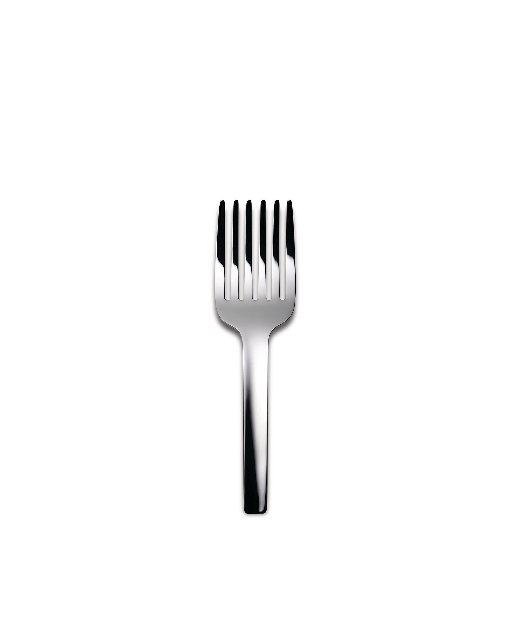 Polished silver serving fork by Alessi with five tines on a white background.