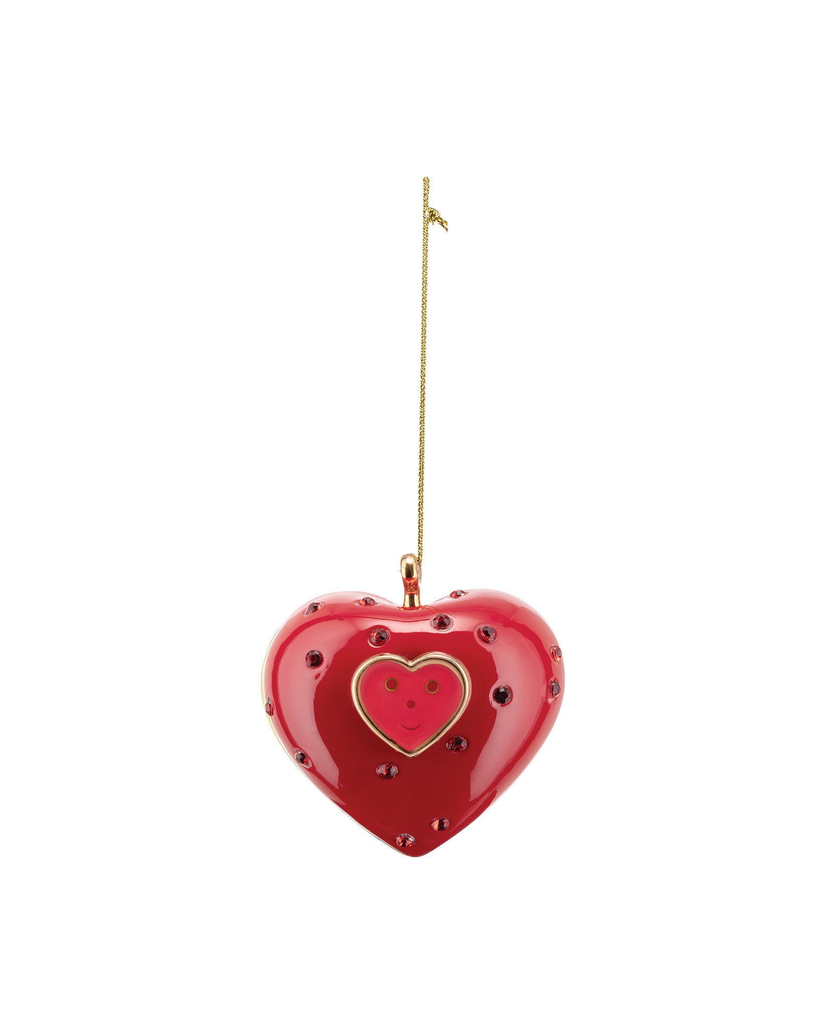 Red heart ornament by Alessi, hanging from a gold chain, adorned with red gems and a gold-framed smiley heart face.