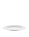 White dinner plate by Alessi, with a scalloped edge and embossed wavy rim texture in an angled view.