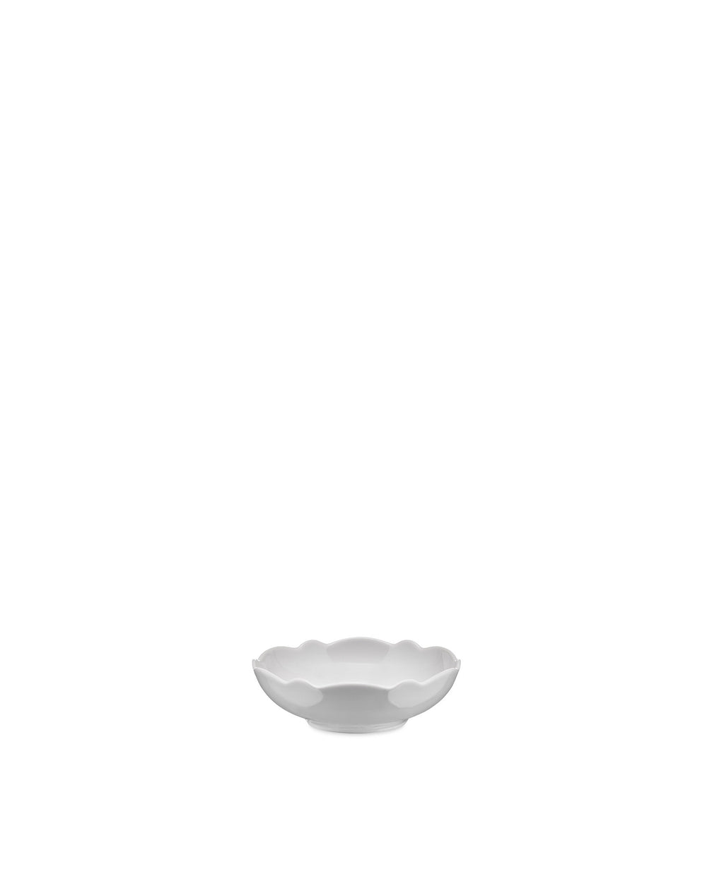 White ceramic bowl by Alessi with a distinctive scalloped rim, viewed from the front.