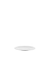 White textured plate by Alessi with an undulating organic pattern, viewed from a slight angle.