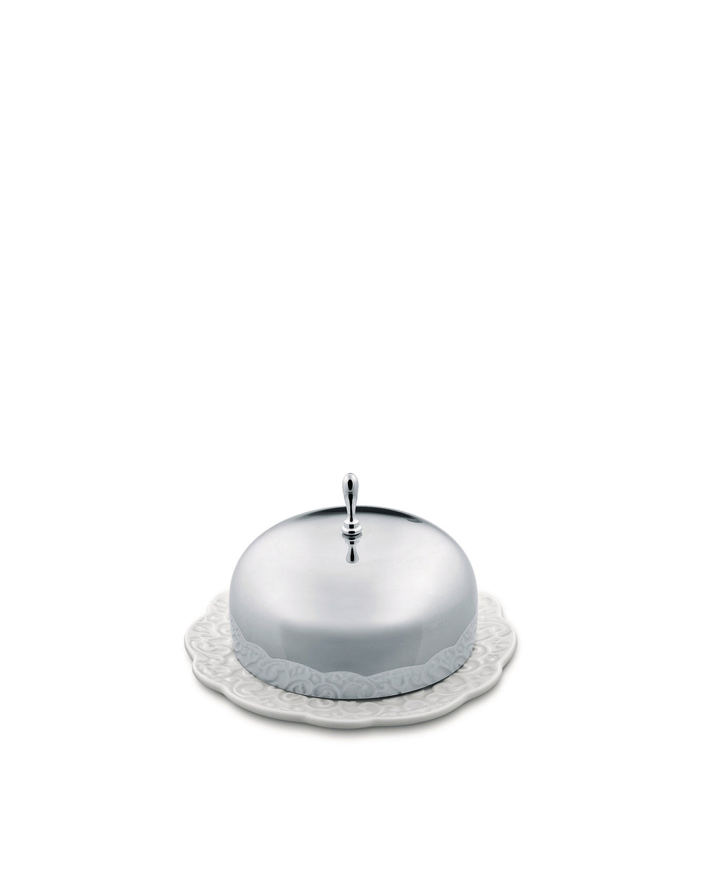 Silver covered butter dish by Alessi with a decorative knob and a white ceramic plate featuring an embossed scrollwork pattern.