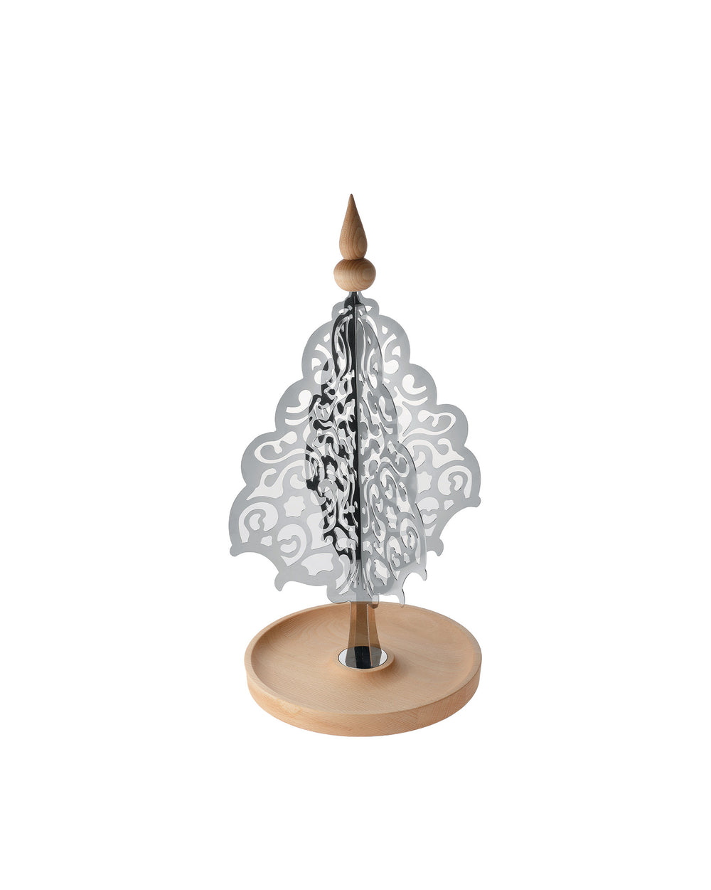 Silver metal Christmas centerpiece by Alessi with ornate scrollwork panels, a natural wood base, and a wooden finial.