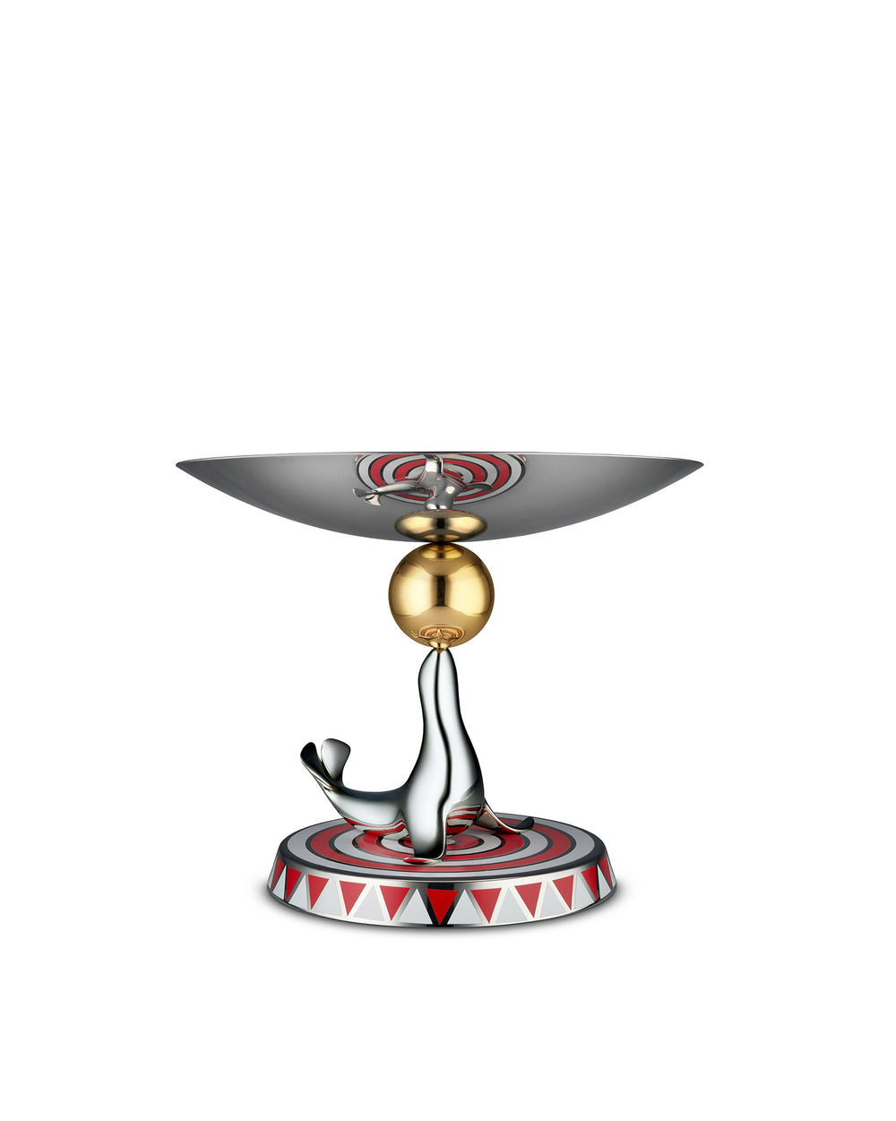 Silver and gold seal decorative stand by Alessi, balancing a golden sphere and a shallow bowl with red and white geometric patterns, on a matching base.