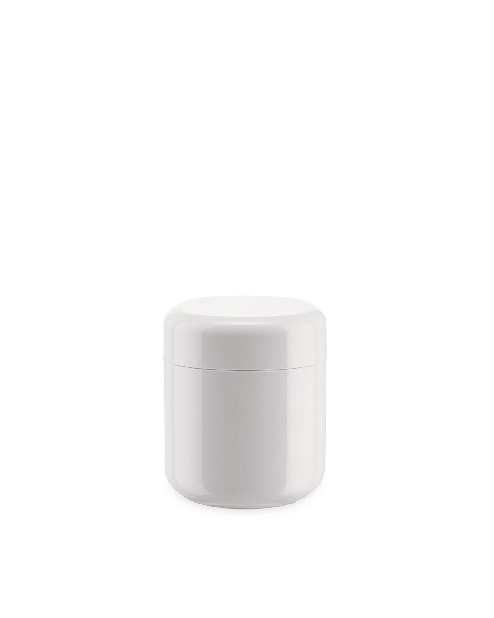 White round container by Alessi with a sleek, glossy finish and visible lid seam on a white background.