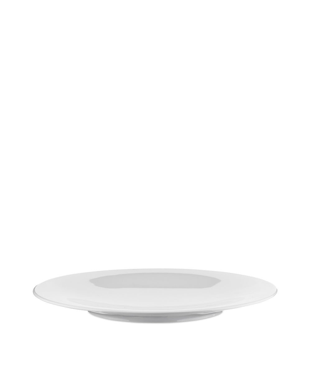 White round plate by Alessi, shown in an angled view with a subtle shadow.