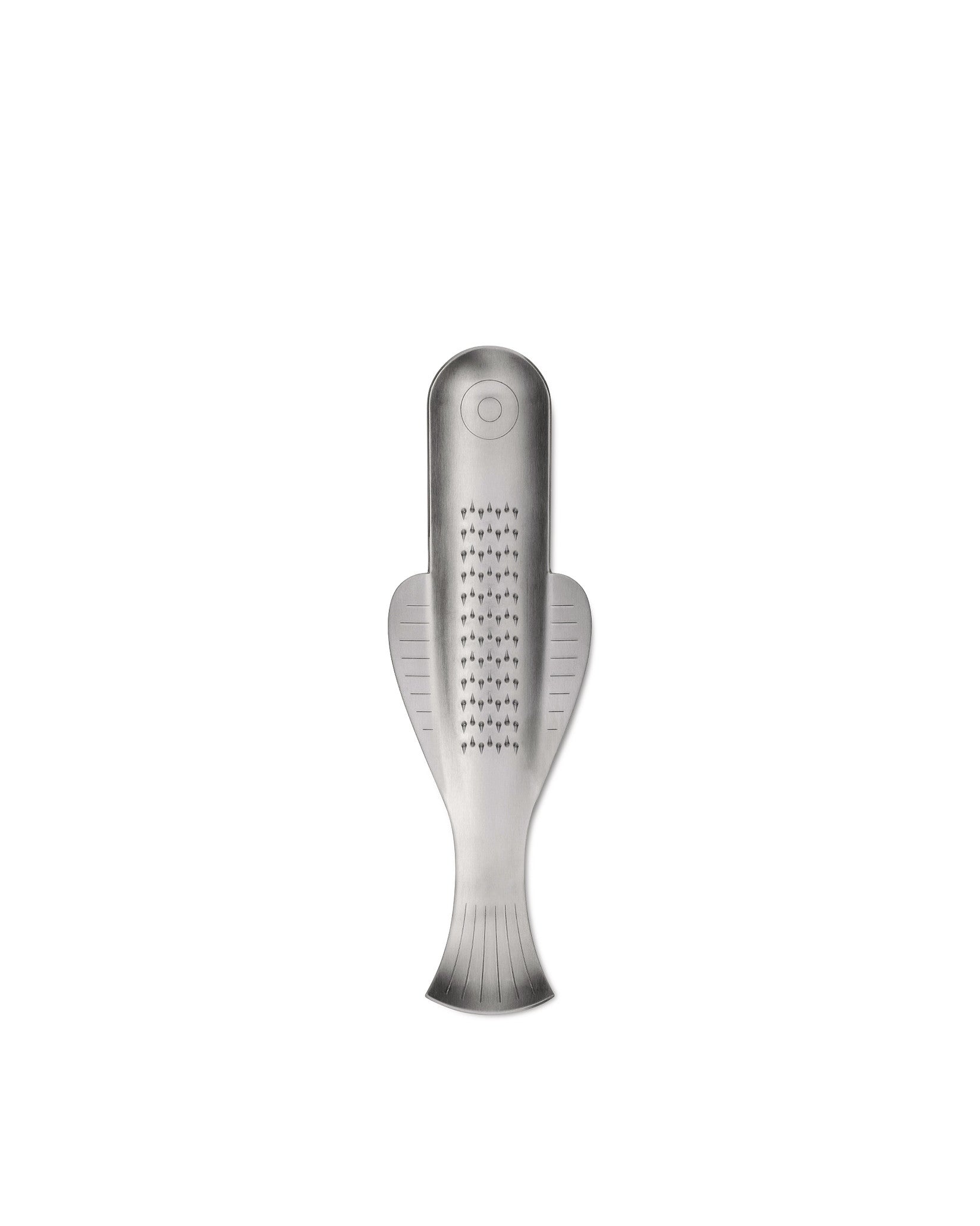 Silver stainless steel grater by Alessi, designed in a fish shape with sharp teeth and line details.