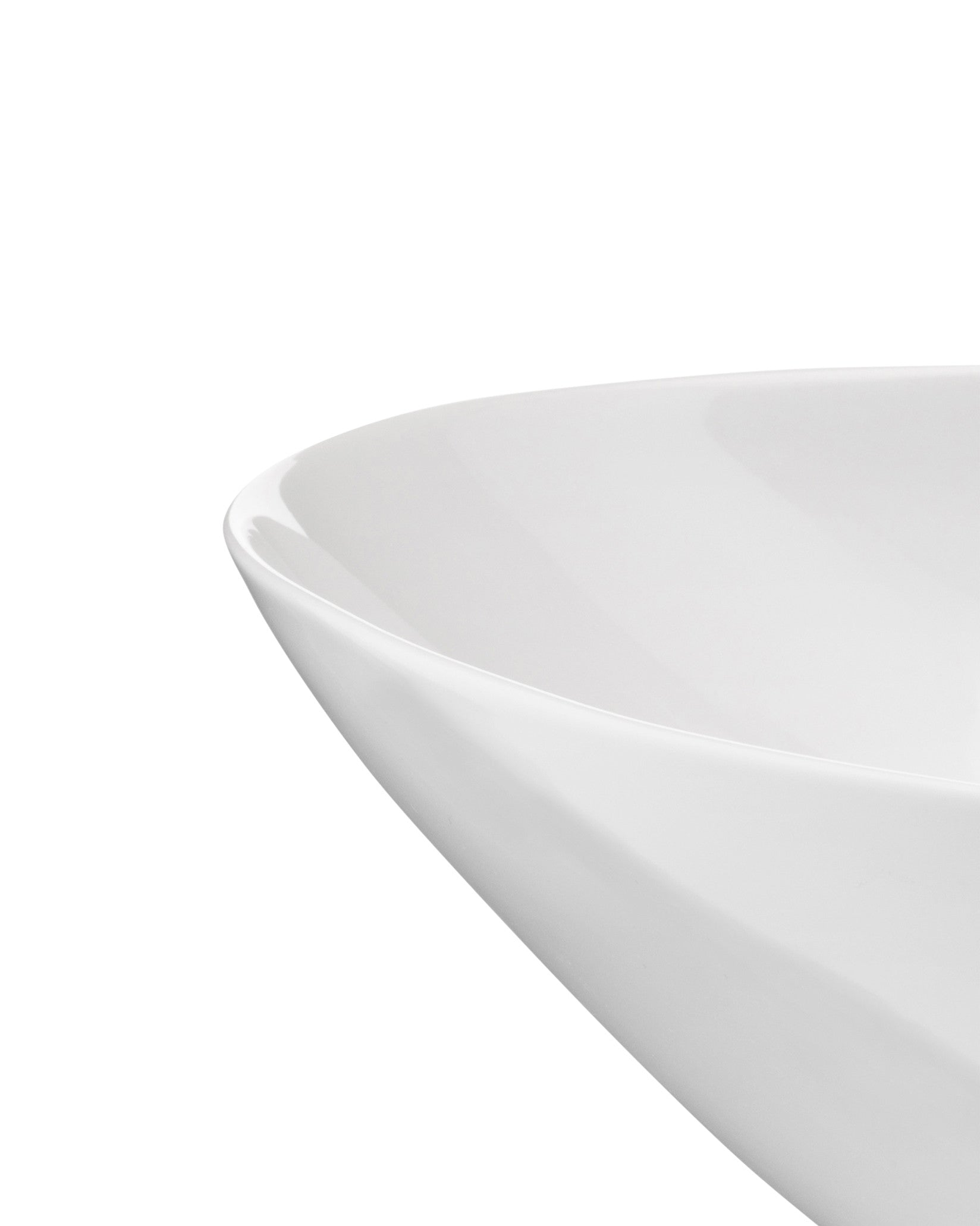White glossy bowl by Alessi with a smooth, curved modern design.