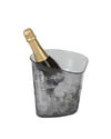Dark grey translucent plastic champagne cooler by Alessi, with a sleek design, holding a gold-foiled champagne bottle and ice.