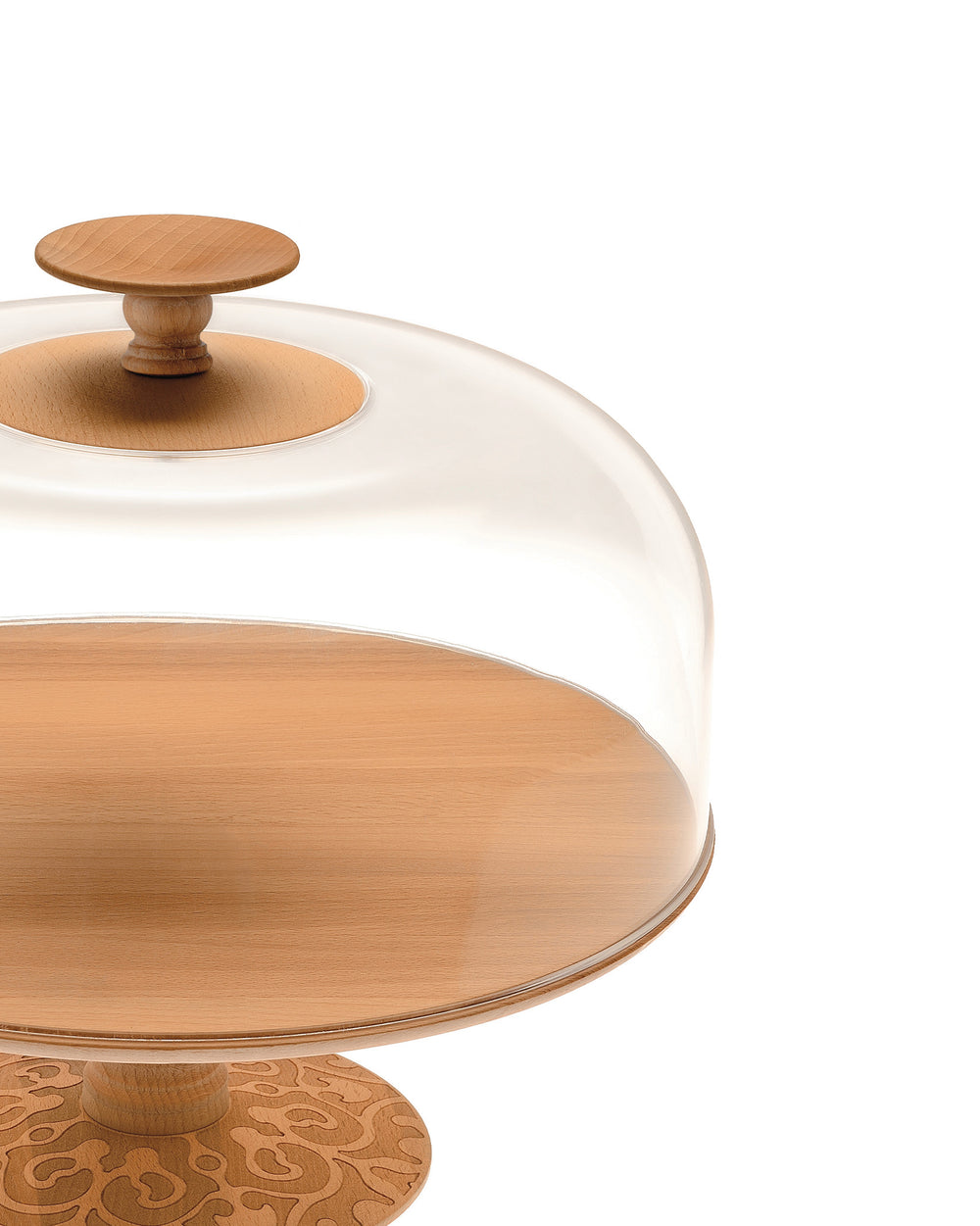 Wooden cake stand by Alessi with a clear glass cloche and an ornate carved base, close-up.
