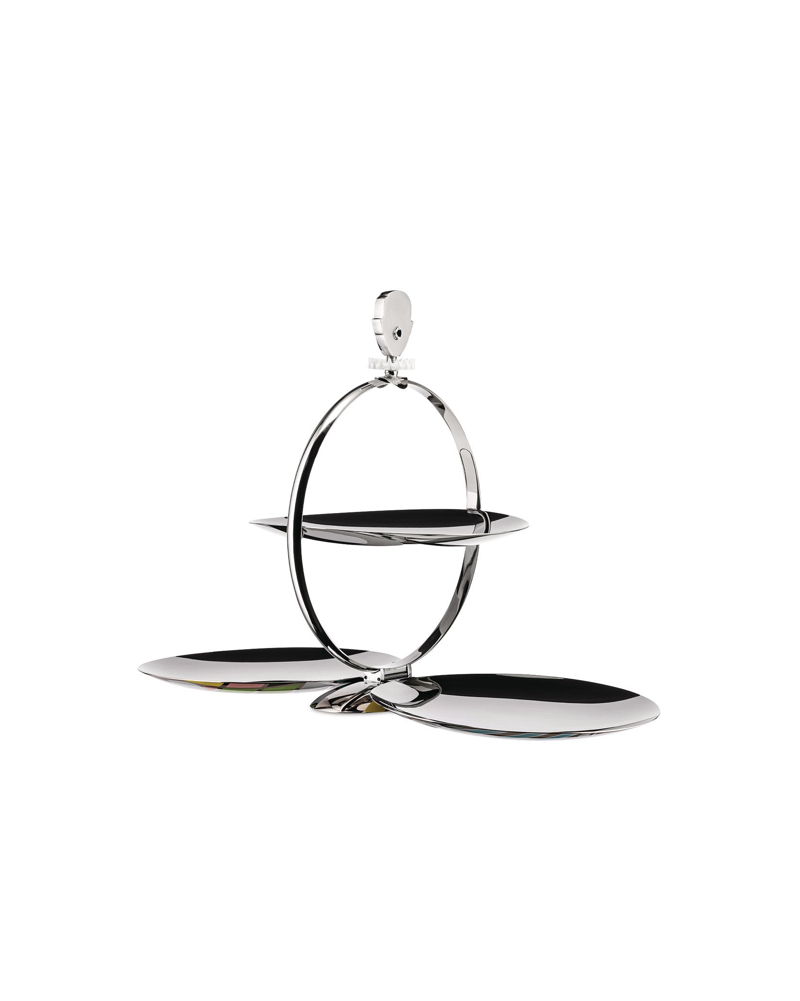 Collapsible silver polished metal tiered serving stand by Alessi, with sculptural circular frame and colorful reflections.