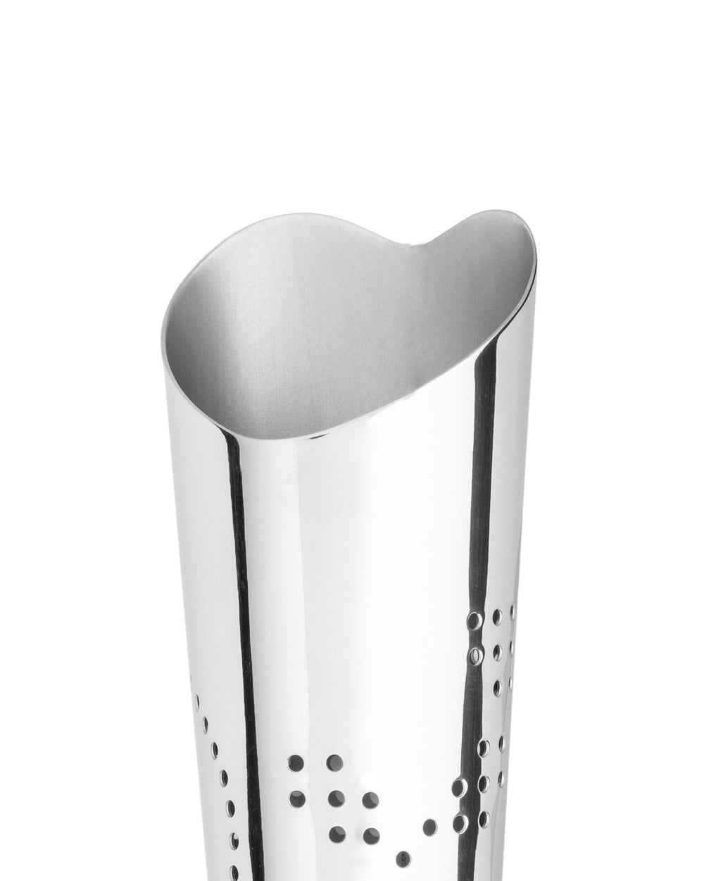 Silver perforated stainless steel object by Alessi with a wavy top edge and a shiny, reflective surface.