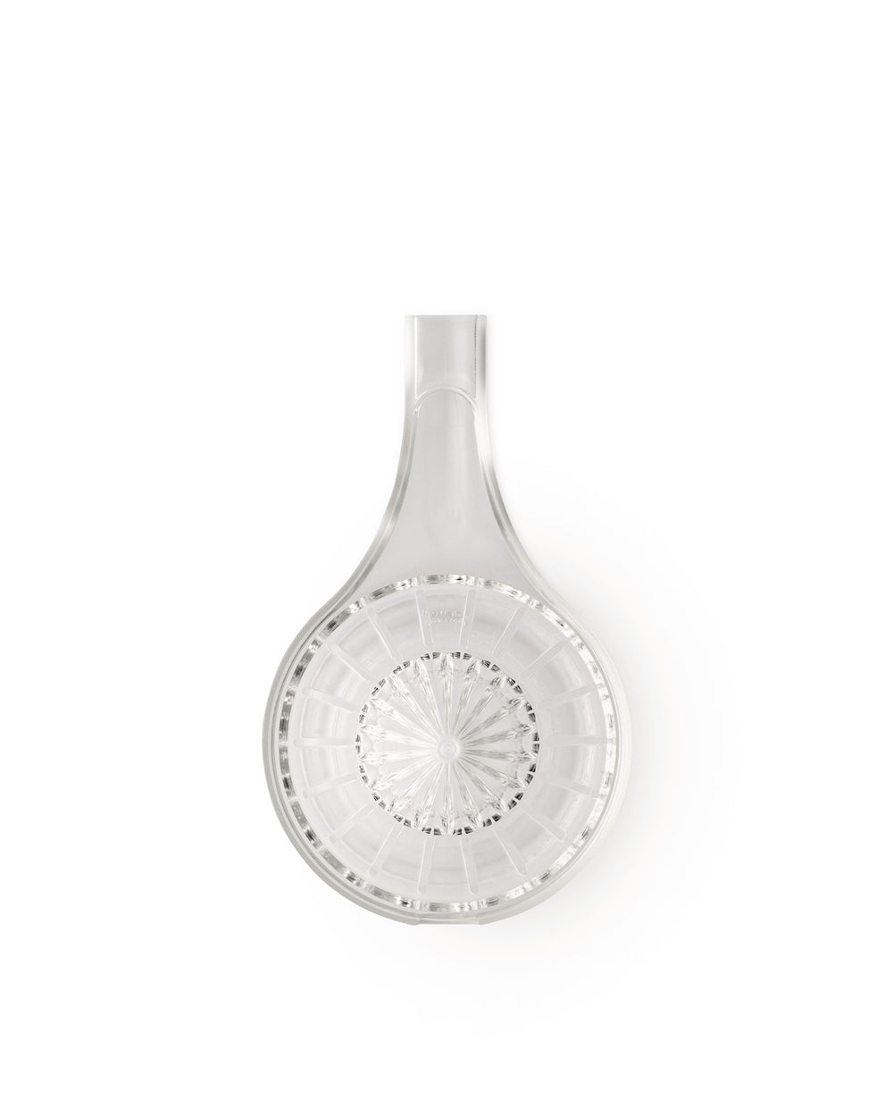 Clear glass citrus squeezer by Alessi, with a wide handle, central starburst pattern, and radial channels, viewed from above.