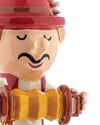 Ceramic Elisabetto figurine by Alessi, with a red hat and mustache, playing a yellow accordion, close-up.