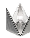 Silver metal egg cup by Alessi, featuring a geometric folded design with a recessed cavity.