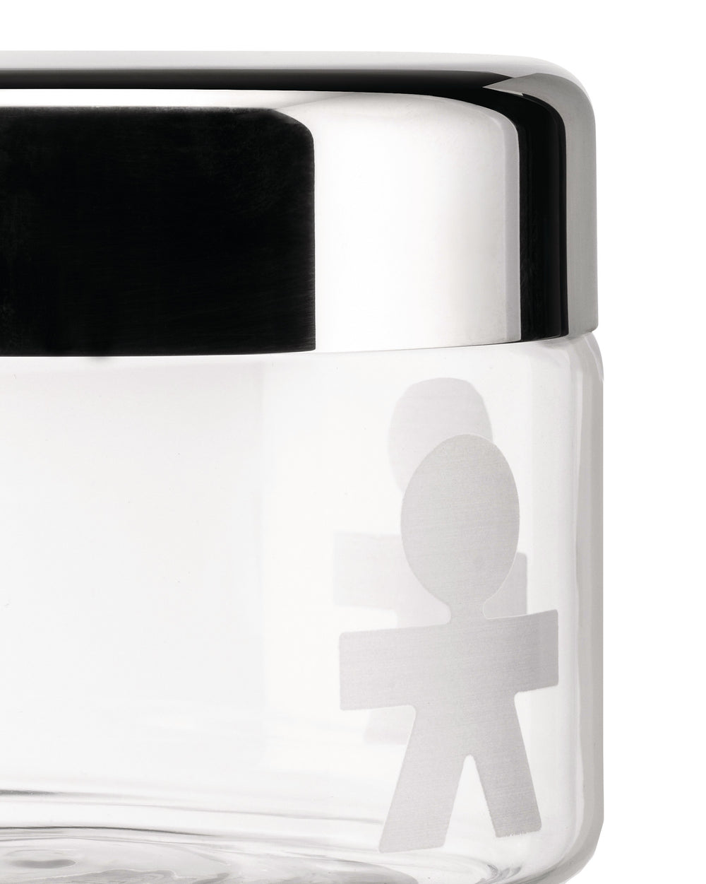 Clear glass storage jar with a chrome lid by Alessi, featuring a frosted boy figure pattern in a close-up side view.