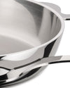 Stainless steel Tegamino pot by Alessi, close-up of the polished interior and attached handle with visible welds.