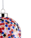 Cropped confetti Christmas ornament by Alessi, a clear globe with multicolored polka dots, silver cap, and chain.