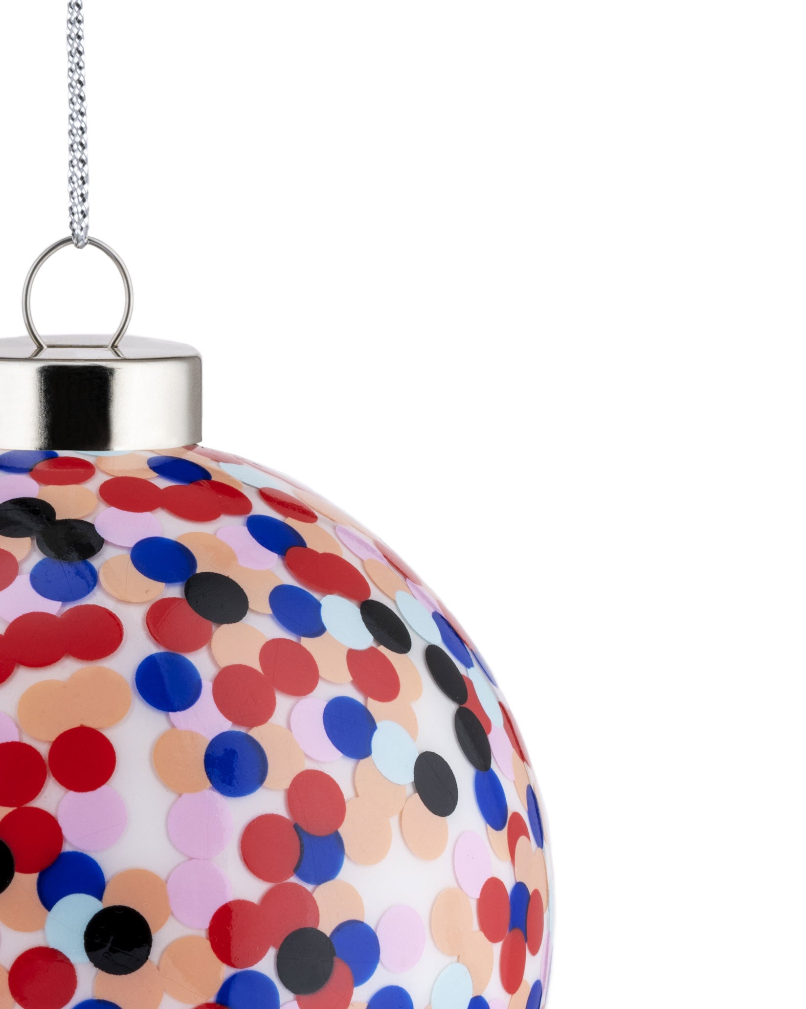 Cropped confetti Christmas ornament by Alessi, a clear globe with multicolored polka dots, silver cap, and chain.