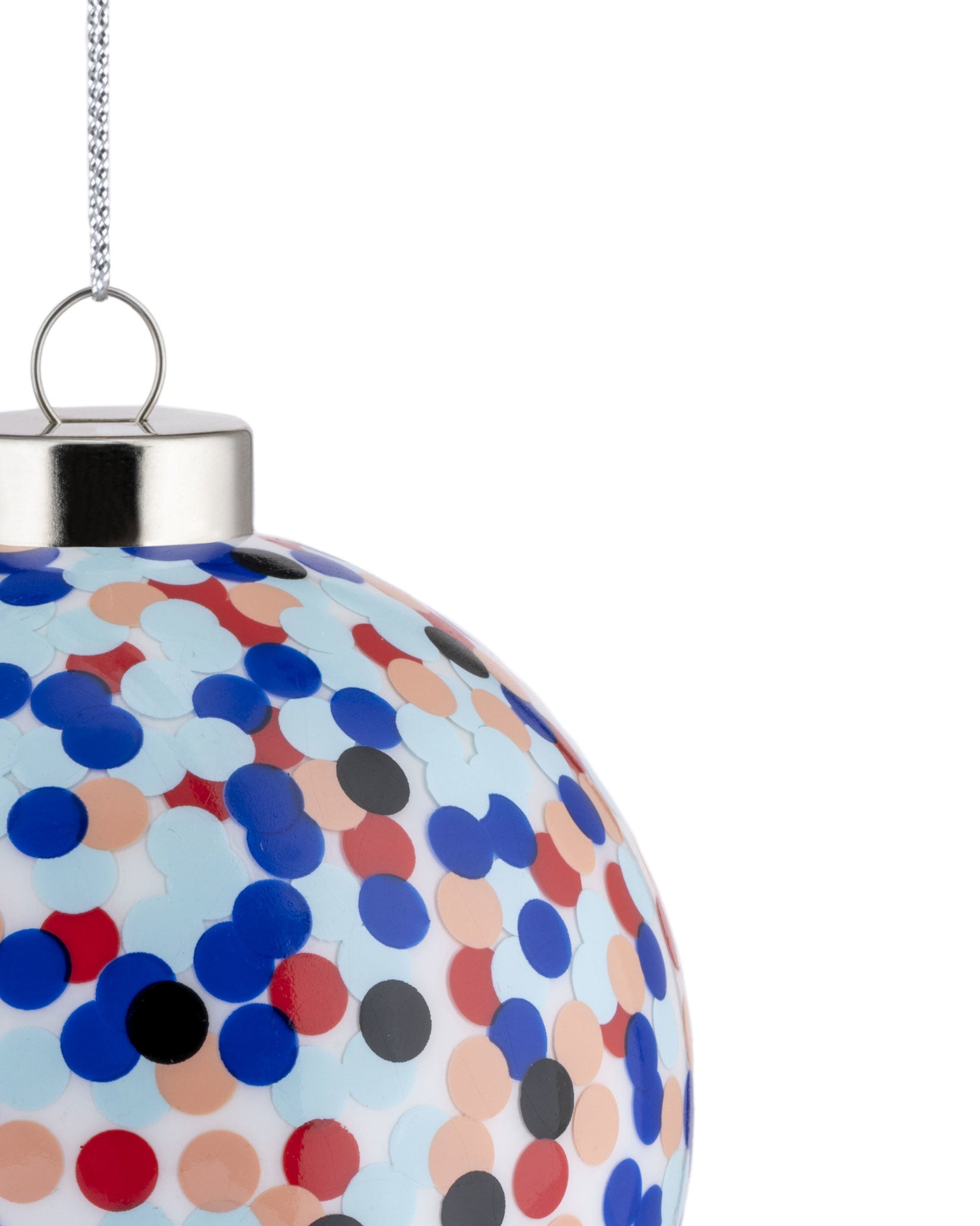 Multi-colored confetti Christmas ornament by Alessi, featuring a silver cap and chain, with blue, red, peach, and black circular dots.