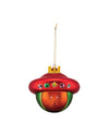 Colorful glass Christmas ornament by Alessi, with a red hat, gold crown, colorful jewels, and a surprised orange face.