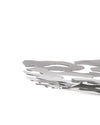Silver metal decorative bowl by Alessi featuring a layered, intricate wavy cut-out design, cropped view.