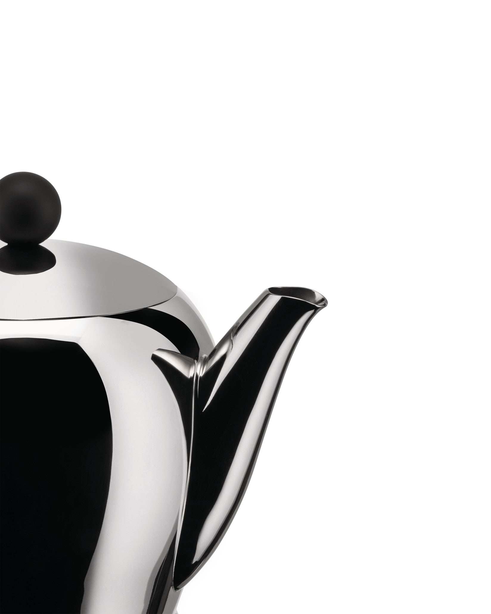 Polished stainless steel teapot by Alessi, with a black spherical lid knob and elegant curved spout, cropped view.
