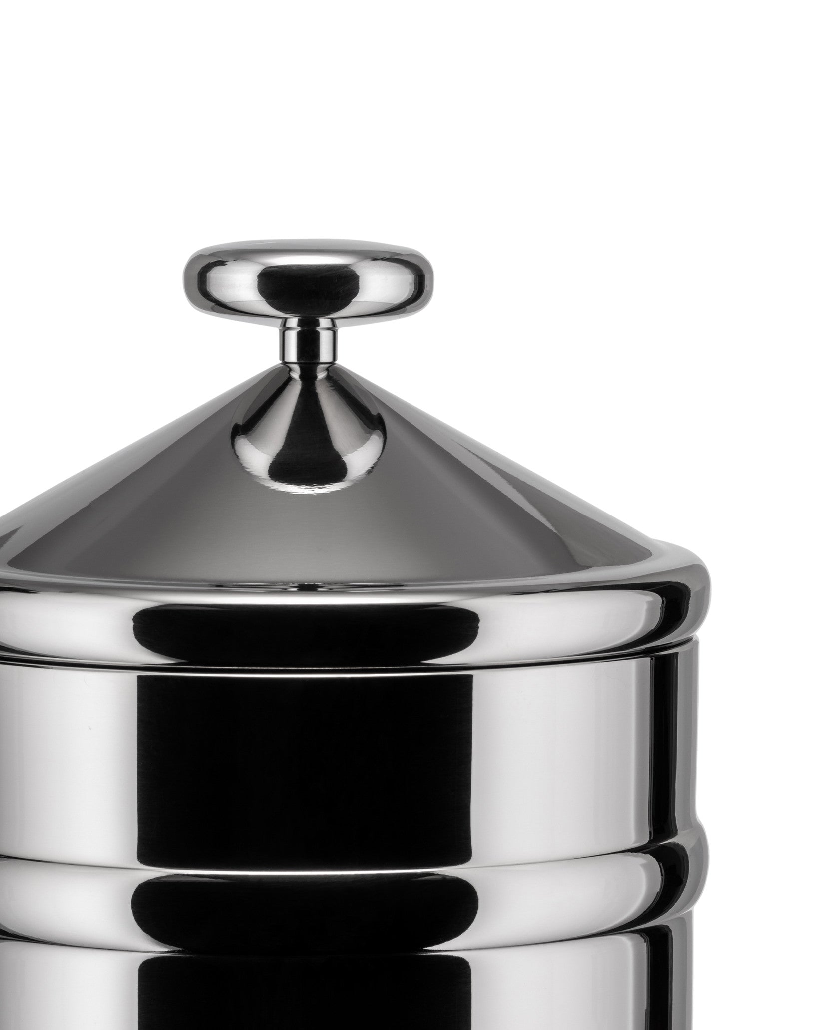 Shiny stainless steel jar by Alessi with a conical lid and round handle, cropped against a white background.