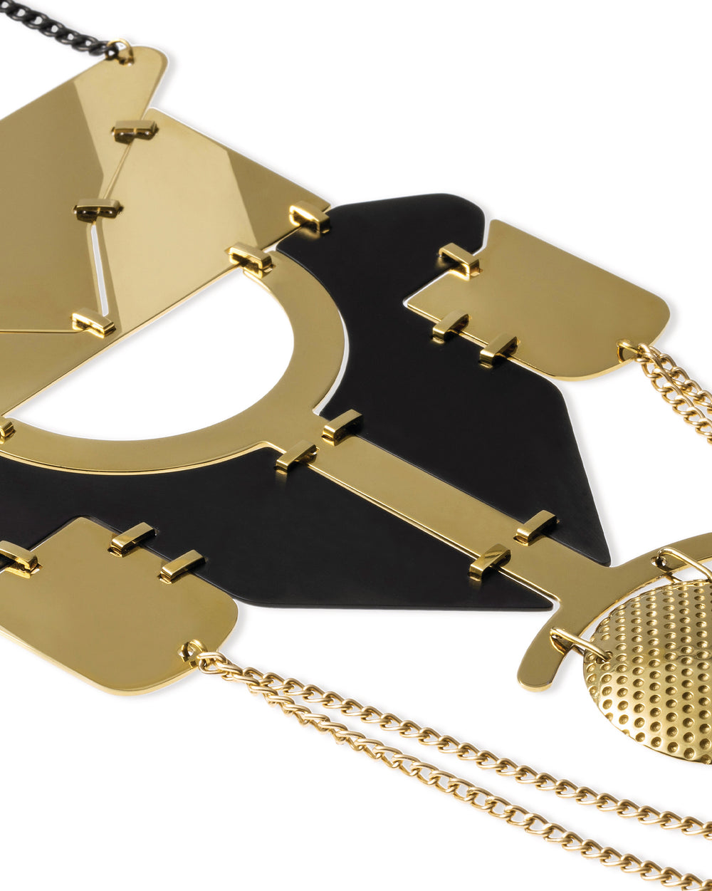 Gold and black geometric Lorica by Alessi, a necklace featuring interlocking plates and a perforated charm.
