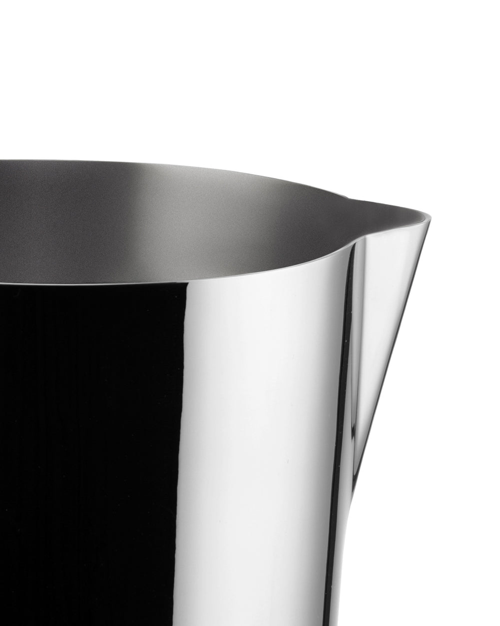 Polished stainless steel pitcher by Alessi, with a glossy exterior, matte interior, and a pouring spout.
